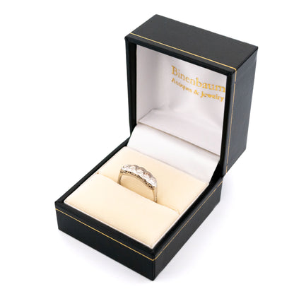 A five stone diamond ring in platinum, in a ring box
