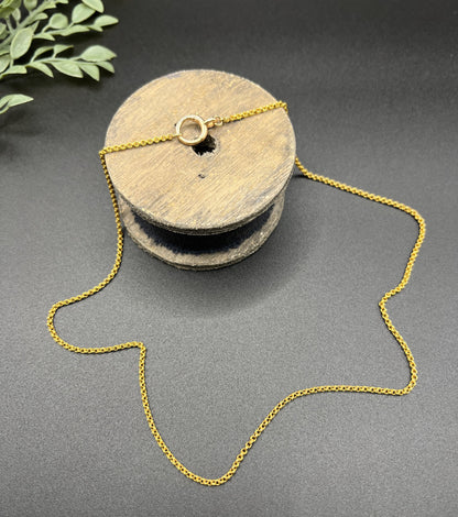 A yellow gold rolo link chain necklace