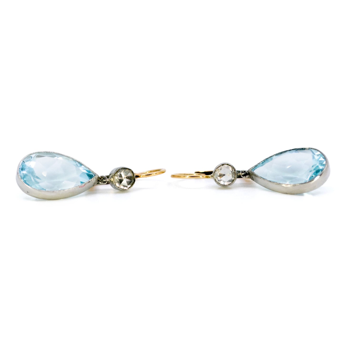 A pair of pear cut aquamarine and rose cut diamond drop earrings