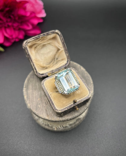 An aquamarine, pearl and diamond large cocktail ring in yellow gold and platinum, in a ring box