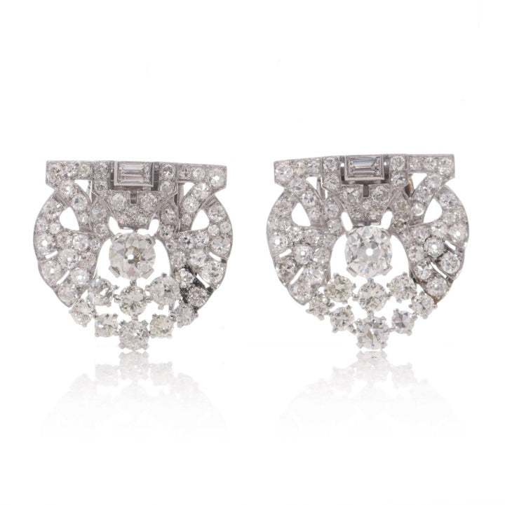 Antique Art Deco 5.52ct Diamond Double Clip Brooch, set with 5.52 carats of old-cut, baguette, and round brilliant diamonds