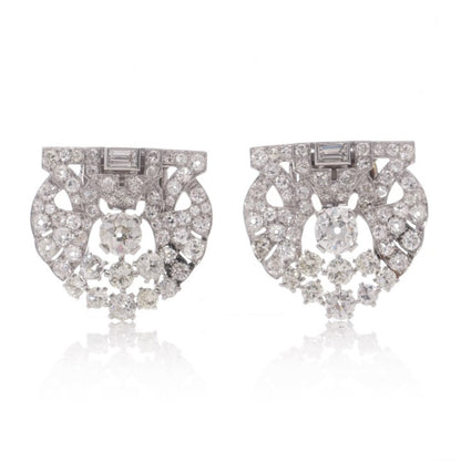 Antique Art Deco 5.52ct Diamond Double Clip Brooch, set with 5.52 carats of old-cut, baguette, and round brilliant diamonds