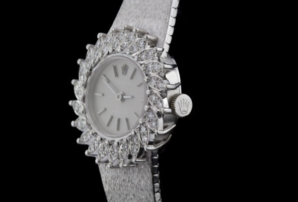 Vintage Rolex 18ct White Gold Manual Watch with Diamond Bezel; solid 18ct white gold manual winding watch with diamond decorated bezel in a sunburst design, Circa 1980s