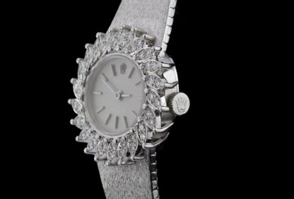 Vintage Rolex 18ct White Gold Manual Watch with Diamond Bezel; solid 18ct white gold manual winding watch with diamond decorated bezel in a sunburst design, Circa 1980s