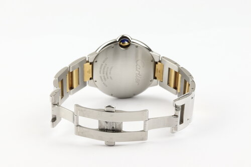 Cartier Ballon Bleu 42mm Steel and Gold Automatic With Papers, Ref. 3001, silver guilloche dial, black Roman numerals, date indicator, cabochon crown, sapphire crystal, steel and gold bracelet with push-button folding clasp, with Cartier papers.