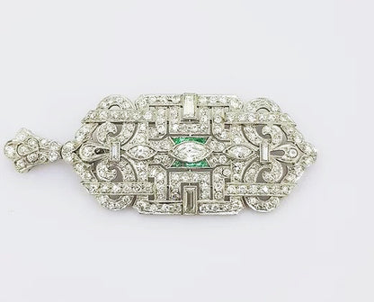 Antique Diamond and Emerald set Brooch Pendant; set with marquise and brilliant cut diamonds, central emerald border, geometric design, 18ct white gold