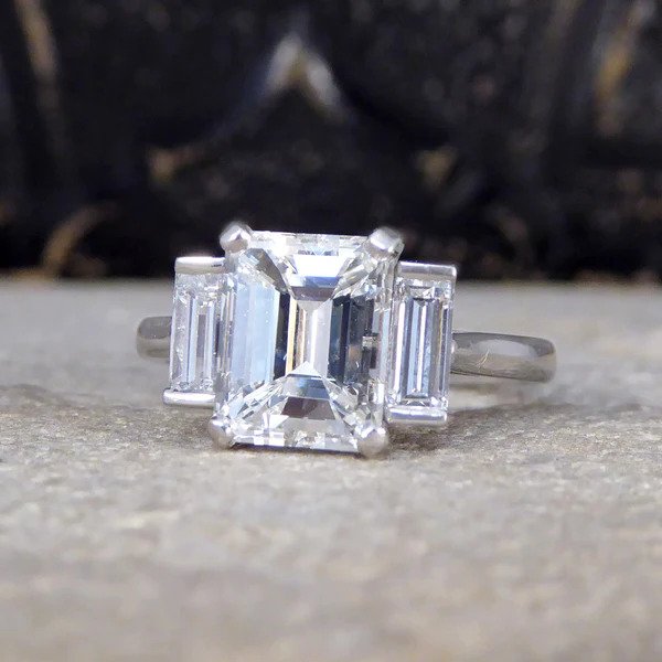 2.57ct Emerald and Baguette Cut Diamond Three Stone Engagement Ring in Platinum