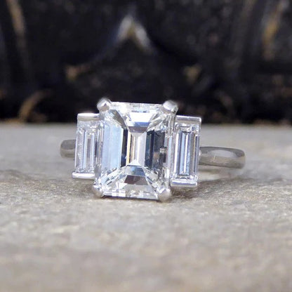 2.57ct Emerald and Baguette Cut Diamond Three Stone Engagement Ring in Platinum