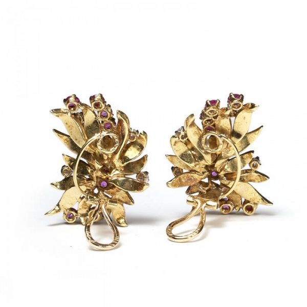 Vintage Ruby, Diamond and 18ct Yellow Gold Floral Earrings; designed as gold petals set with 3.50cts round-cut rubies and 0.75cts round brilliant-cut diamonds, Circa 1960