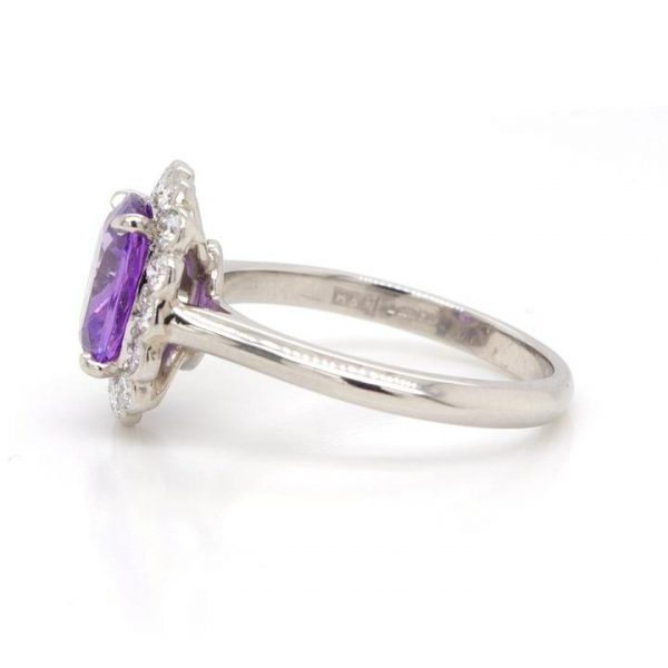 Cushion Cut Purple Sapphire and Diamond Cluster Ring; beautiful and unusual unheated 2.27 carat purple cushion cut sapphire set within a surround of 0.43cts collet-set diamonds, in platinum, with certificate