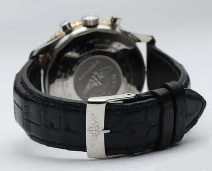 Breitling Navitimer Cosmonaute 41mm Steel and Gold Manual Chronograph Watch, on a black leather strap with Breitling pin buckle, with Breitling papers.