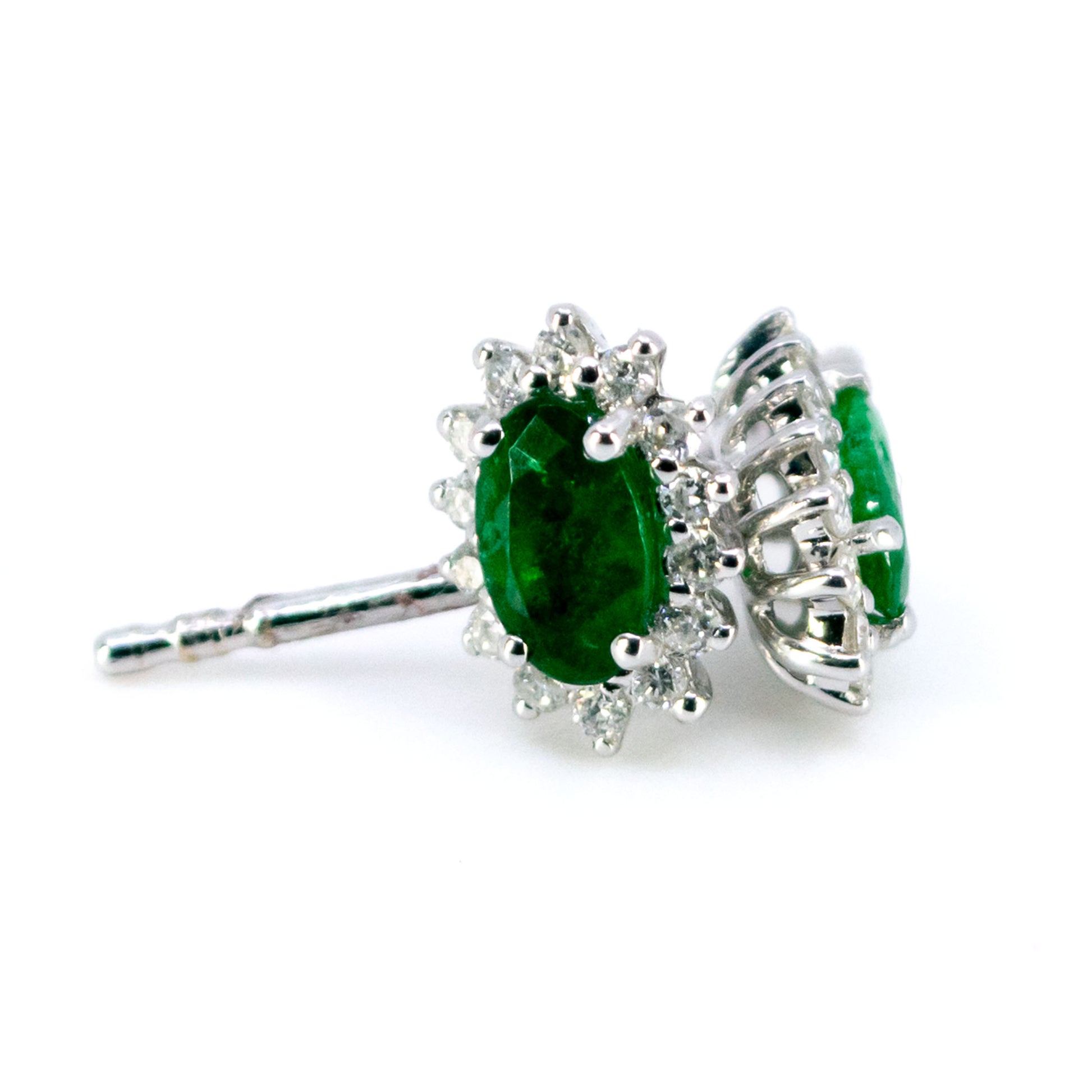 Modern 18 Carat White Gold Emerald and Diamond Oval Cluster Stud Earrings