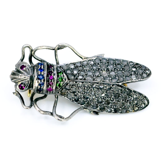 An insect brooch set with diamonds, sapphires, rubies and emeralds
