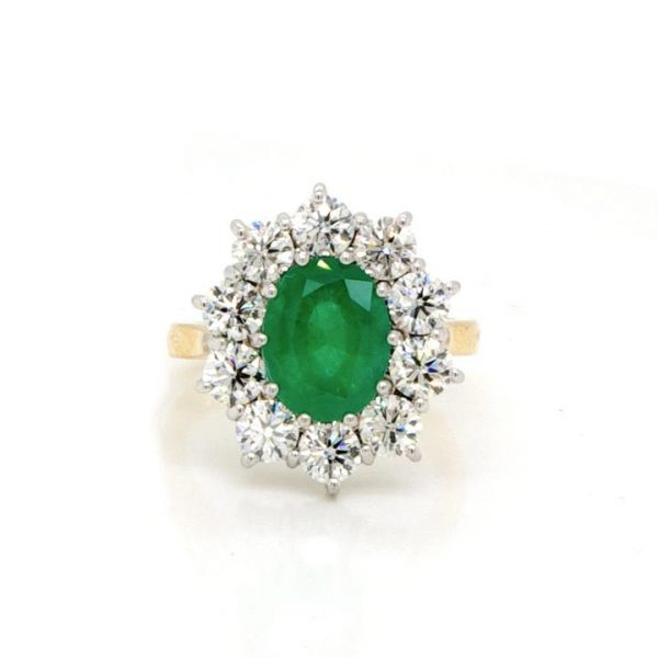 Emerald, Diamond and 18ct Gold Oval Cluster Ring; central 2.15ct oval faceted emerald within a surround of 2.15cts brilliant cut diamonds