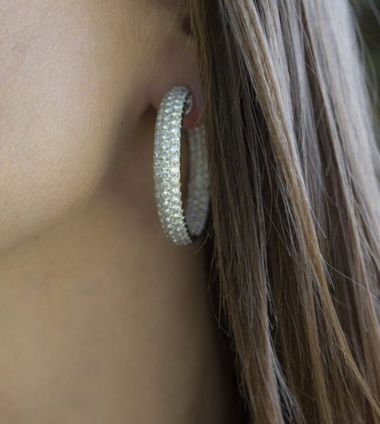 Diamond Hoop Earrings; featuring three rows of brilliant-cut diamonds, 8.19 carat total, in 18ct white gold with pierced heart detailing