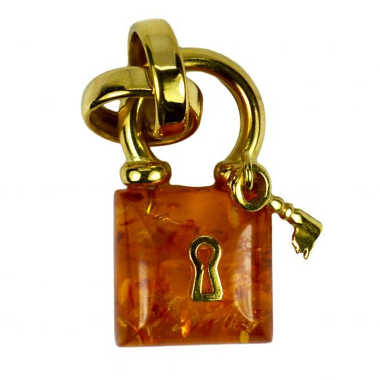 Amber and 18ct Gold Padlock Charm Pendant; French 18ct yellow gold and clarified amber charm pendant designed as a padlock with key