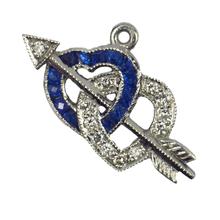 Sapphire, Diamond and Platinum Interlocking Hearts and Cupids Arrow Charm Pendant; platinum charm pendant designed as a pair of interlocking hearts set with 0.12cts white diamonds and 0.15cts blue sapphires, connected by Cupid’s arrow