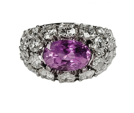 Vintage Pink Sapphire and Diamond Dress Ring; central certified 3.23ct oval natural pink sapphire surrounded by 4.30cts brilliant cut diamonds, in platinum, French, Circa 1960