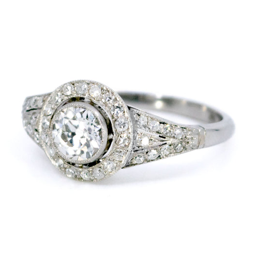 A diamond halo cluster ring in platinum
