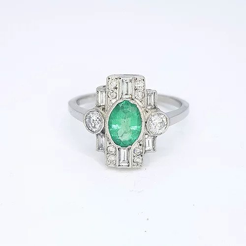 Art Deco Style Emerald and Diamond Plaque Ring; 0.77ct oval emerald surrounded by 0.60cts baguette and round cut diamonds, in 18ct white gold