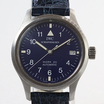 IWC Pilot Aviator Mark II Limited Edition Automatic Watch; 36mm titanium case with blue dial, Arabic numerals and date aperture, on a leather strap with platinum buckle, comes with IWC box. One of 500 examples made in 1993.