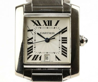 Cartier Gents Tank Française 18ct White Gold 28mm Automatic Rectangular Watch, silver guilloche dial, black Roman numerals, date aperture at 6, sapphire crystal glass, cabochon blue gem set crown, on Cartier 18ct bracelet with hidden double deployment clasp. With Cartier booklet and certificate dated 2006.