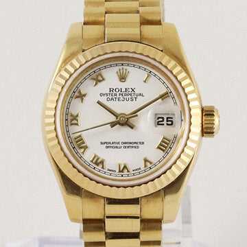 Rolex Lady Datejust 18ct Yellow Gold 179178 Automatic Watch; white dial, Roman numerals, date indicator and sapphire crystal, 18ct yellow gold President bracelet with 18ct yellow gold Crownclasp, with Rolex box and papers.