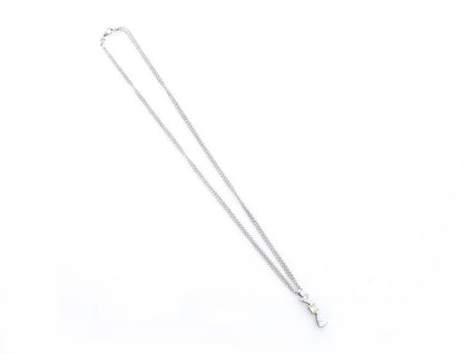 Filk Italian Diamond Drop Pendant Necklace, 1.55 carat total, oval fancy yellow diamond, triangular and pear-cut diamond, VVS clarity, F colour, Circa 1990's