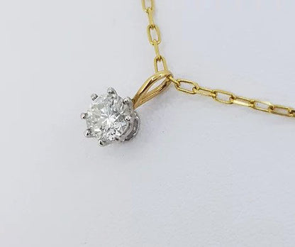 0.75ct Diamond Solitaire Pendant, single 0.75 carat round brilliant-cut diamond, claw set and suspended on a chain, in 18ct yellow gold.