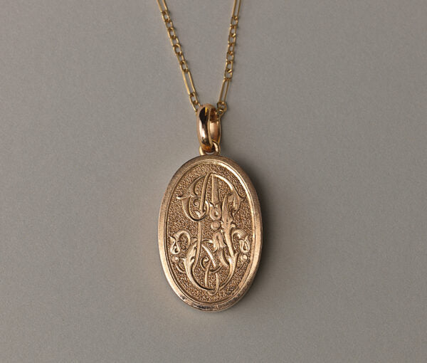 Antique Victorian 18ct Yellow Gold Oval Locket, open work scrolls, ornamental initial A set with rose cut diamonds. French, 19th century