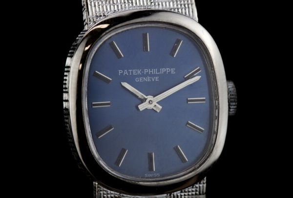 Patek Philippe Mini Ellipse 18ct White Gold Ladies Vintage Manual Watch, Ref 4226, sunburst blue dial, on an 18ct Patek Philippe bracelet strap, Circa 1980