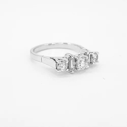 Brilliant and Baguette Cut Diamond Five Stone Ring; three round brilliant-cut diamonds alternated with two baguette-cut diamonds, 0.75 carats, in 18ct white gold