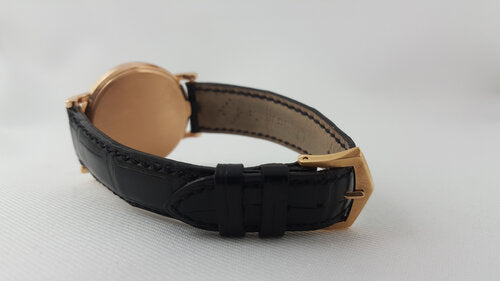 Patek Philippe 3802R Calatrava 18ct Rose Gold 33mm Automatic watch, porcelain-white dial, black Roman numerals, date aperture at 3, Patek Philippe black leather strap, Circa 1994, mint condition, with Patek Philippe pouch and Extract.