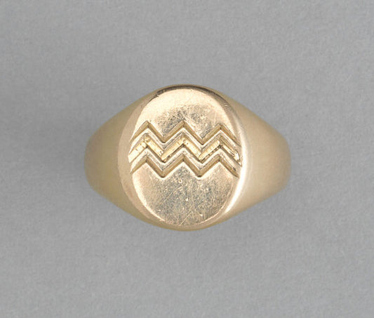 Vintage French 18ct Yellow Gold Aquarius Signet Ring; 18ct gold seal ring with the symbol of the Aquarius zodiac. Master mark: Jean Després