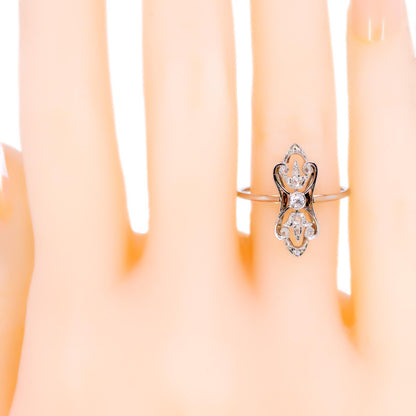 A diamond elongated ring in platinum, modelled on a hand