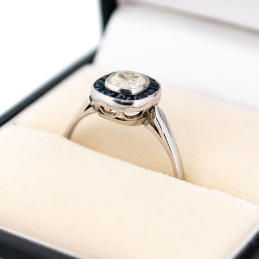 Platinum, Sapphire and Diamond Halo Cluster Ring, 0.55 Carat
