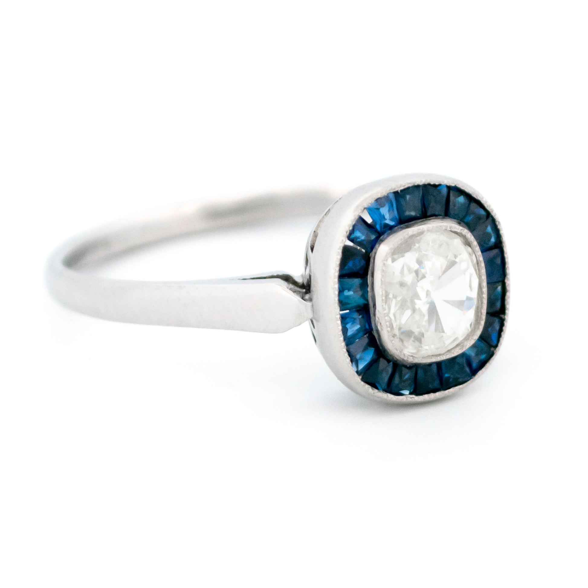 Platinum, Sapphire and Diamond Halo Cluster Ring, 0.55 Carat