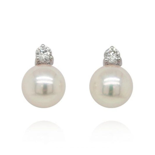 Akoya Pearl and Diamond Earrings; featuring round Akoya cultured pearls topped with 0.20cts diamond studs. Mounted in 18ct white gold, with post and butterfly fittings