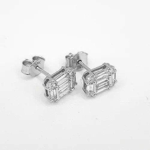 Baguette Cut Diamond Stud Earrings; central baguette-cut diamond with a baguette cut diamond surround accented with brilliant cut diamonds at each corner, 0.77 carat total, in 18ct white gold