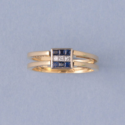 Vintage Princess Cut Diamond Reversible Ring with Sapphires or Rubies; once side set with six princess-cut sapphires in two rows flanking a line of princess-cut diamonds in the middle, the other side set with six-princess cut diamonds in two rows flanking a line of princess-cut rubies, in 18ct gold, Italy, Circa 1980