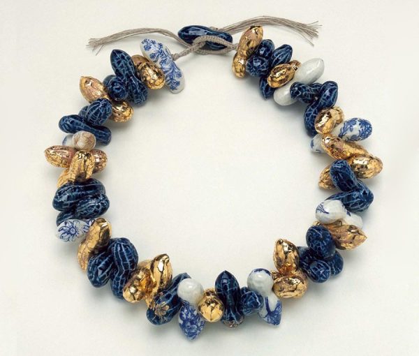 Contemporary Pauline Wiertz Ceramic Peanut Feeding The Birds Necklace; a chunky signature piece comprising of gilt and painted ceramic peanut shaped beads