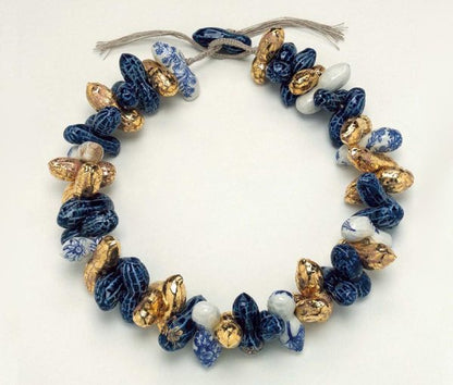 Contemporary Pauline Wiertz Ceramic Peanut Feeding The Birds Necklace; a chunky signature piece comprising of gilt and painted ceramic peanut shaped beads