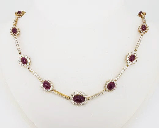 Natural Burma Ruby and Diamond Cluster Necklace; oval cabochon-cut natural Burmese rubies surrounded by diamonds, 15.00 carats, 18ct yellow gold, Certified