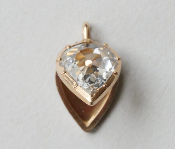 Bell and Bird Old Cut Pear Shaped Diamond Set 18ct Gold Locket; 18ct yellow gold locket pendant set with a large 3.13 carat flat old-cut pear-shaped diamond