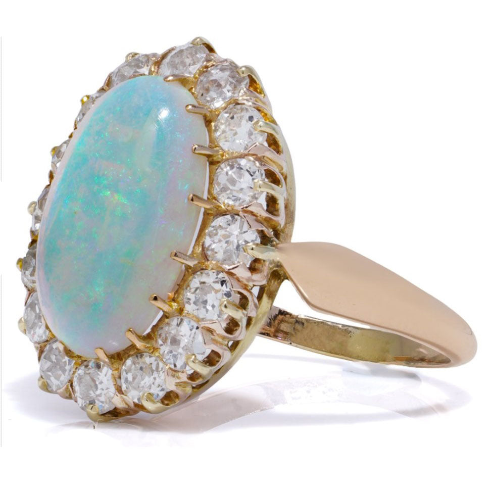 Victorian Antique Opal and Diamond Cluster Engagement Ring, oval cabochon opal surrounded by 1.12cts old-cut diamonds in 14ct yellow gold