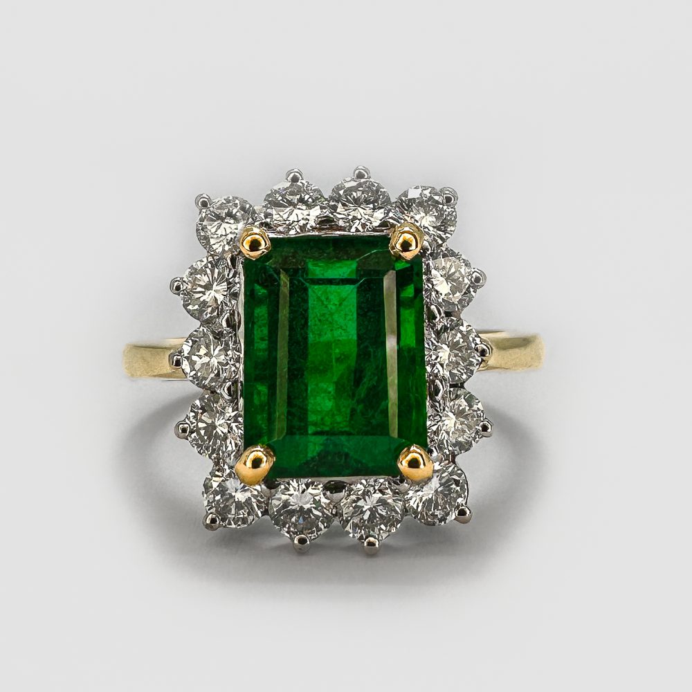 Vintage emerald and diamond rectangular cluster ring
