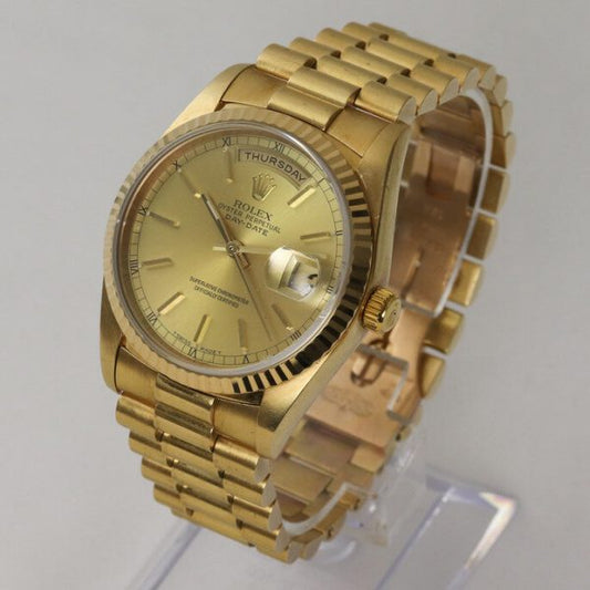 Vintage Rolex Day Date President 18238 18ct Yellow Gold 36mm Automatic Watch; gold-colour dial, weekday and date functions and sapphire crystal, 18ct yellow gold President bracelet with 18ct Crownclasp, with Rolex box, Circa 1990s