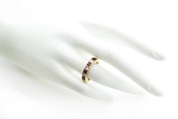 Garrard Princess Cut Ruby and Diamond Half Eternity Ring, 0.64ct princess-cut rubies and 0.48cts princess-cut diamonds, in 18ct Yellow Gold