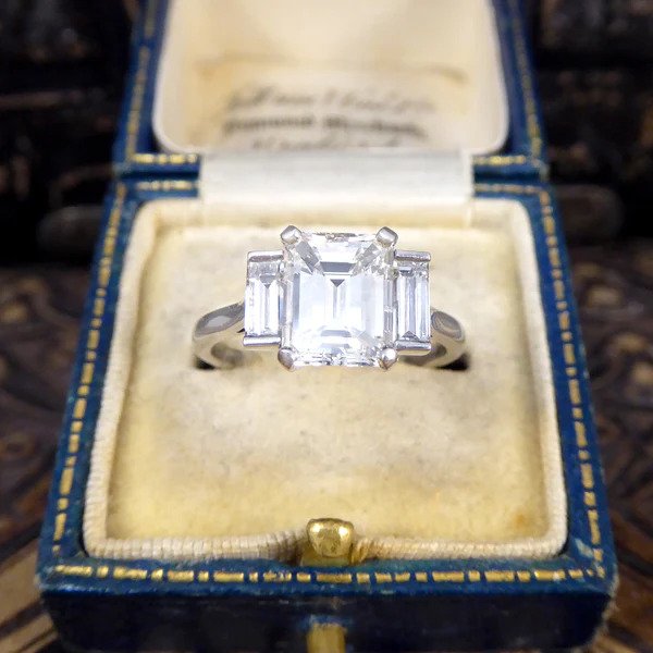 2.57ct Emerald and Baguette Cut Diamond Three Stone Engagement Ring in Platinum