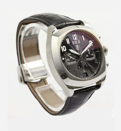 Tag Heuer Monza 38mm Steel Automatic Chronograph; Ref. CR5110, black dial with Arabic numerals, calibre 36 movement visible through the display back, on a TAG Heuer black leather strap with stainless steel push-button deployment buckle.